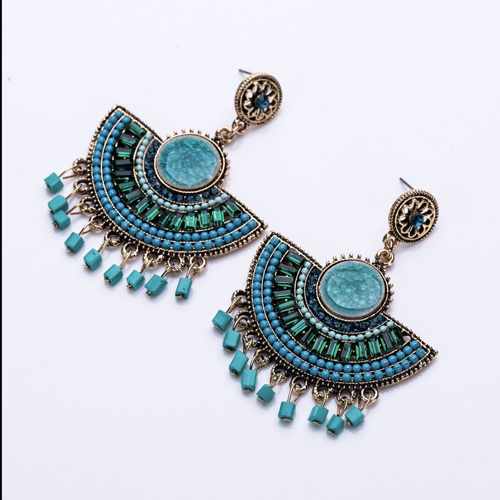 Before: earrings on white background